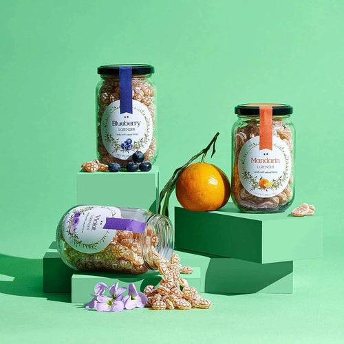 Gourmanity’s honey lozenge collection includes violet, mandarin, and blueberry candy